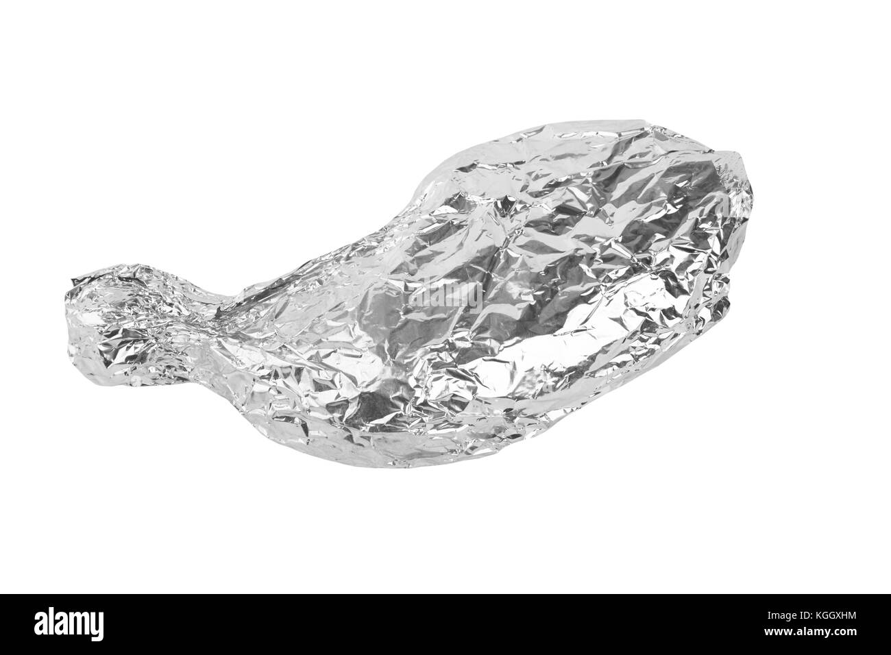 Frozen chicken leg wrapped in aluminum foil isolated on white. Stock Photo