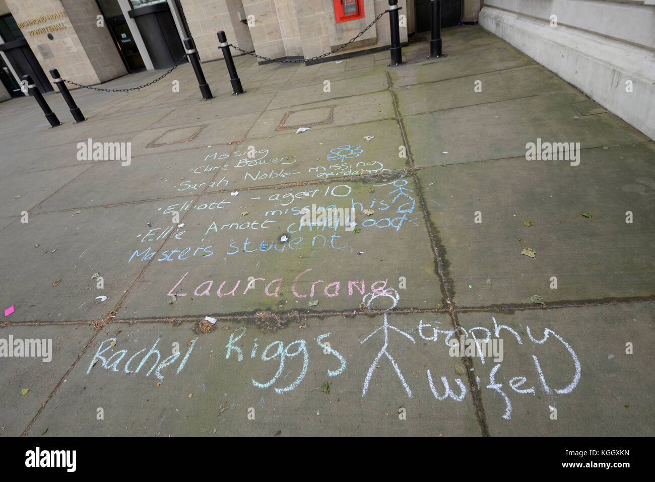 Chalked on the pavement outside Richmond House, Whitehall, London. Missing people claims. Space for copy Stock Photo