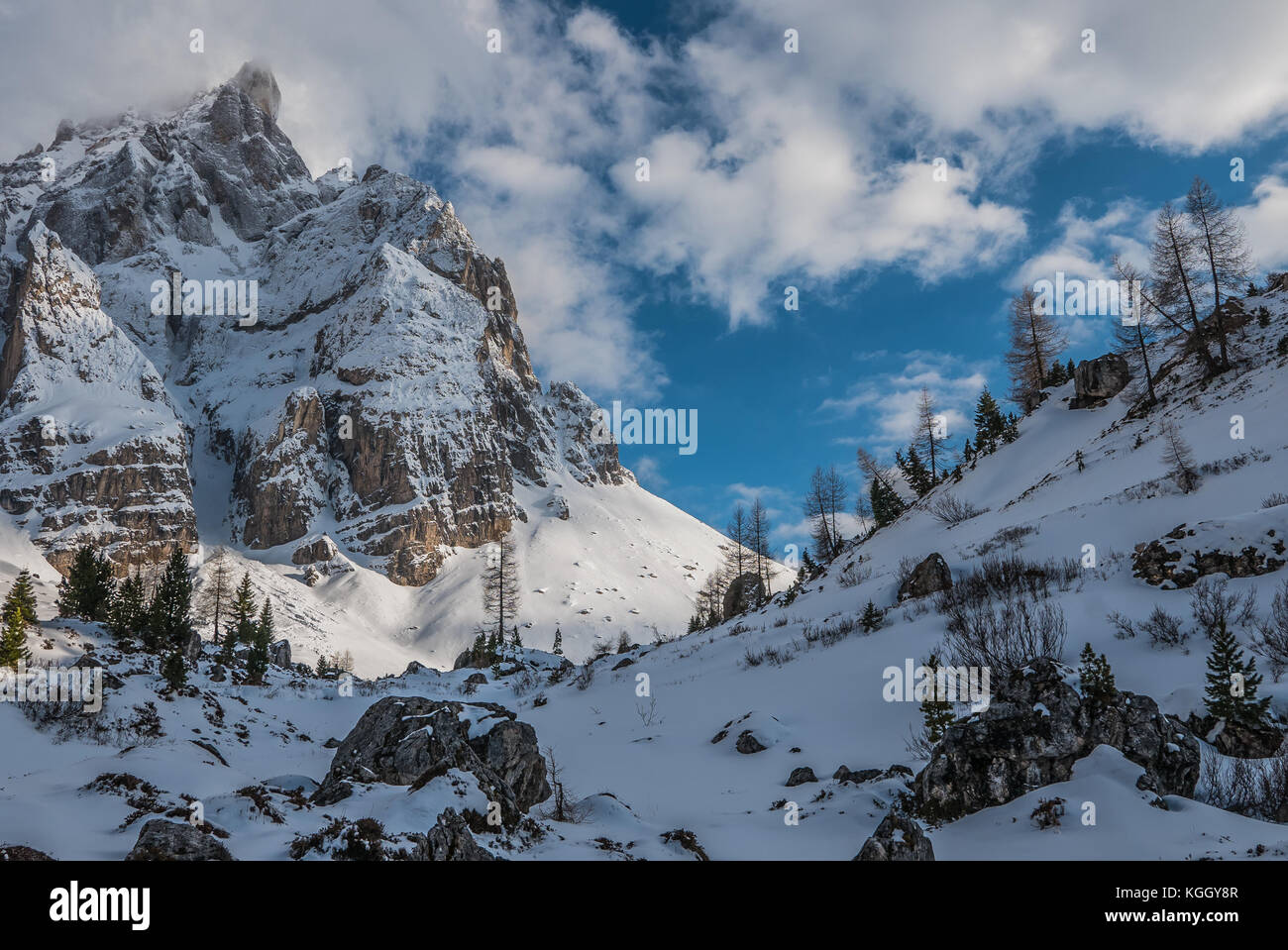 Sunset over the winter valley, beauty of Val Venegia and Passo Rolle in Italian Dolomites Stock Photo