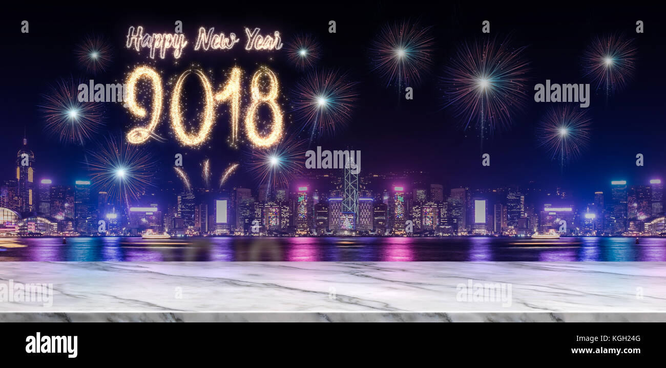 Happy new year 2018 fireworks over cityscape at night with empty white