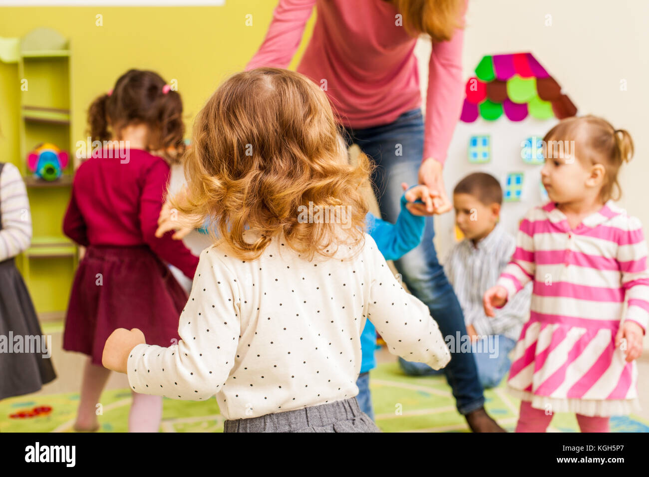Group of little children dancing  Stock Photo