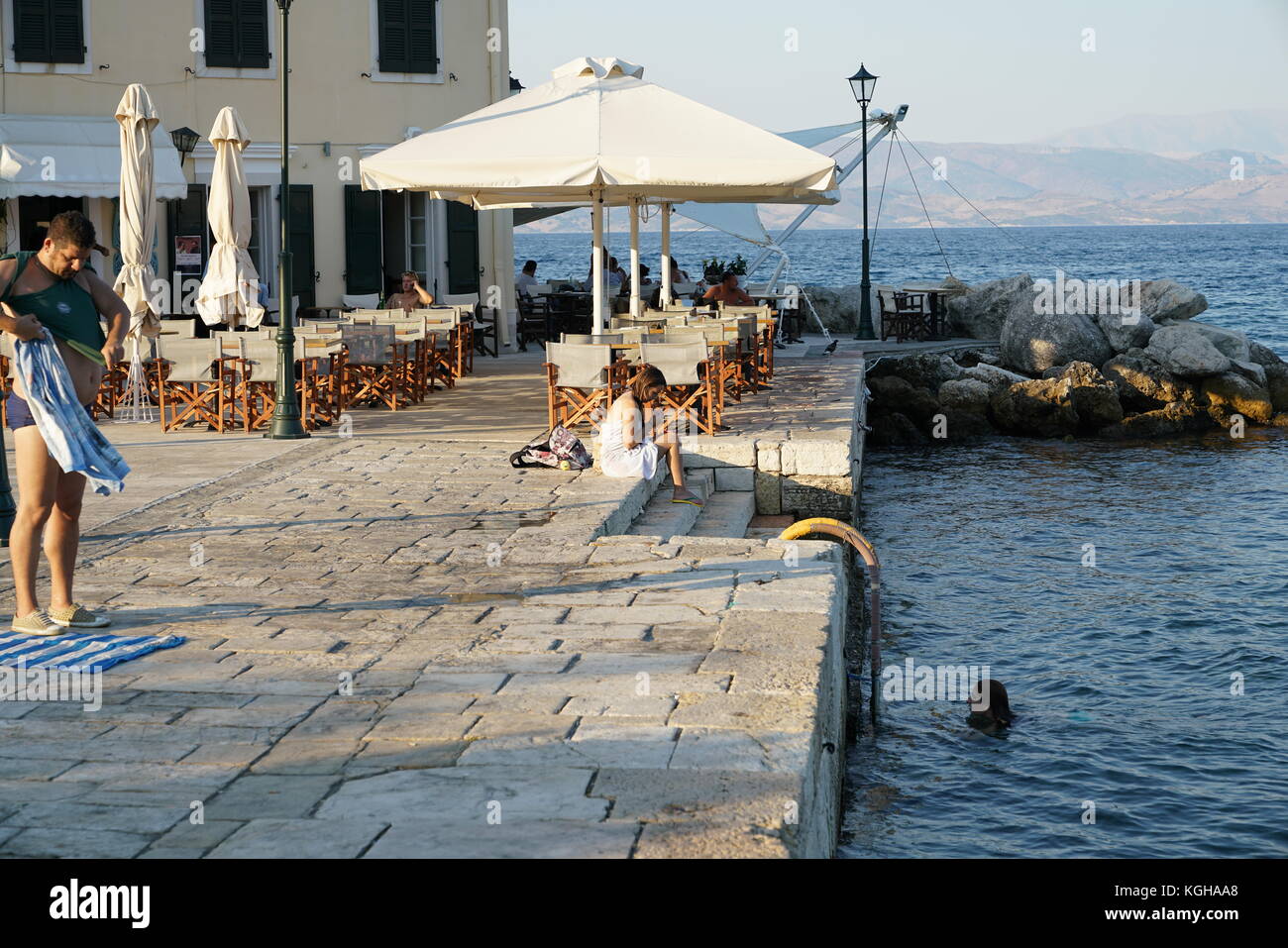 Corfu, Greece: People at the beach Stock Photo - Alamy