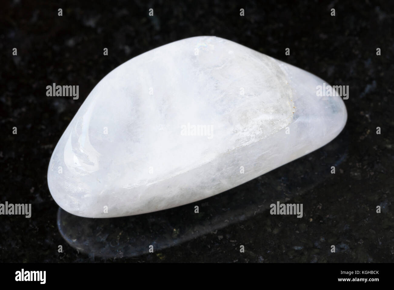 macro shooting of natural mineral rock specimen - tumbled white ...