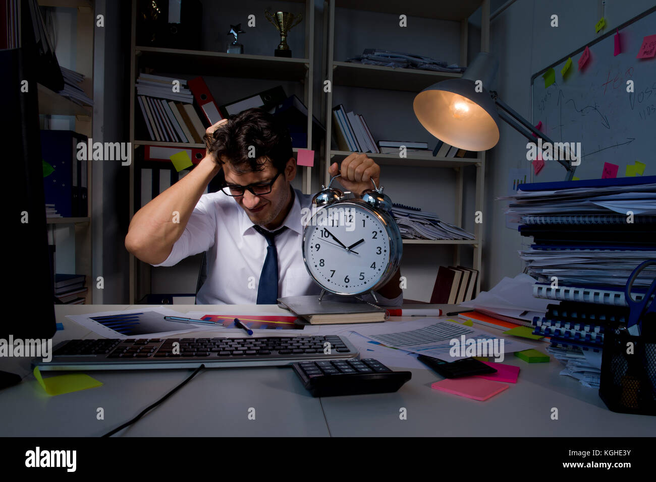 Man businessman working late hours in the office Stock Photo Alamy