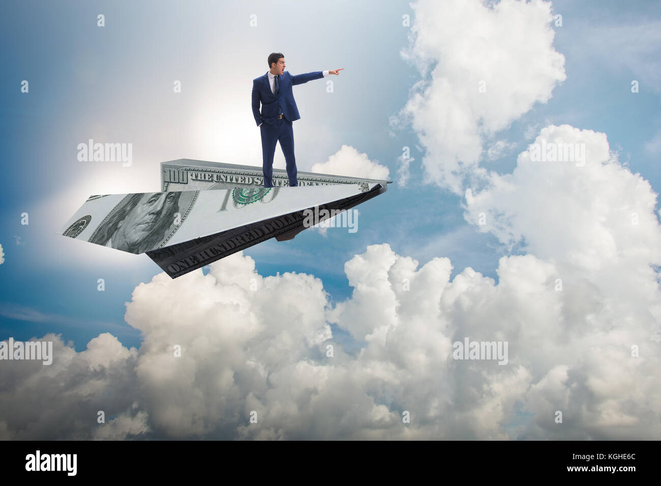Businessman flying on paper plane in business concept Stock Photo - Alamy