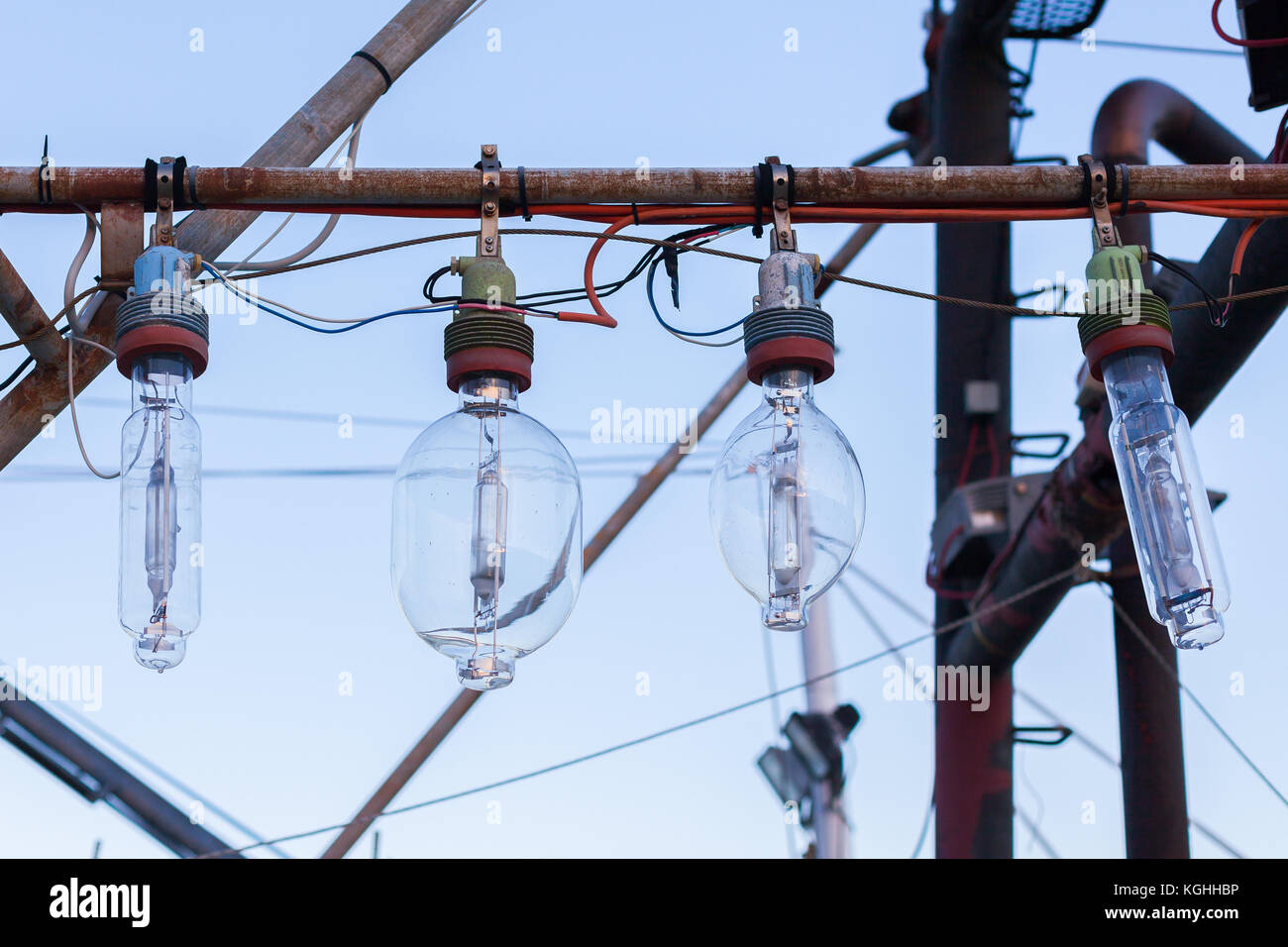 Old light bulbs hanging from a pole, located on the Great Ocean Road, Victoria Stock Photo