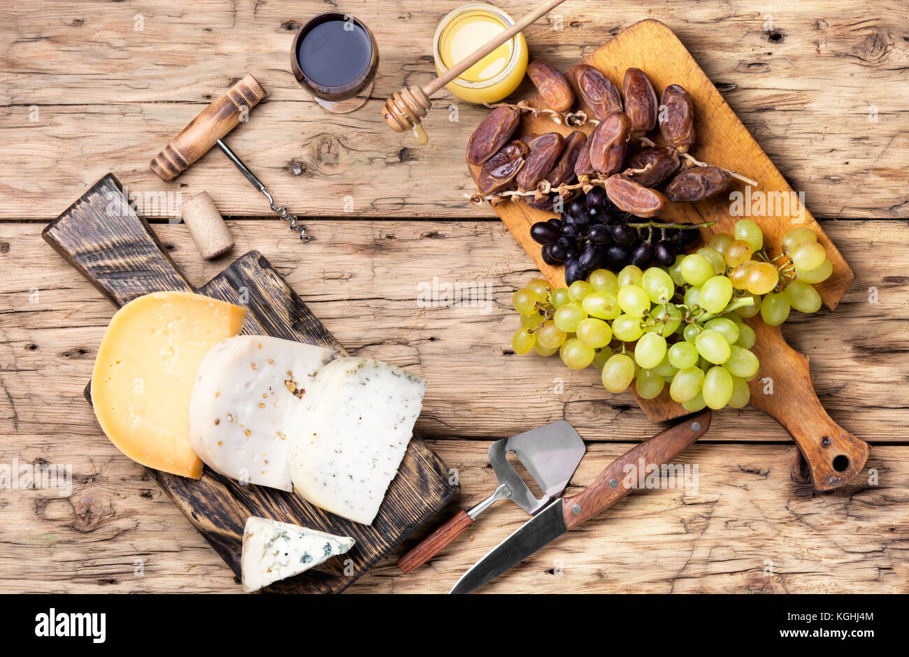 aromatic Swiss cheese and glass of grape wine Stock Photo Alamy