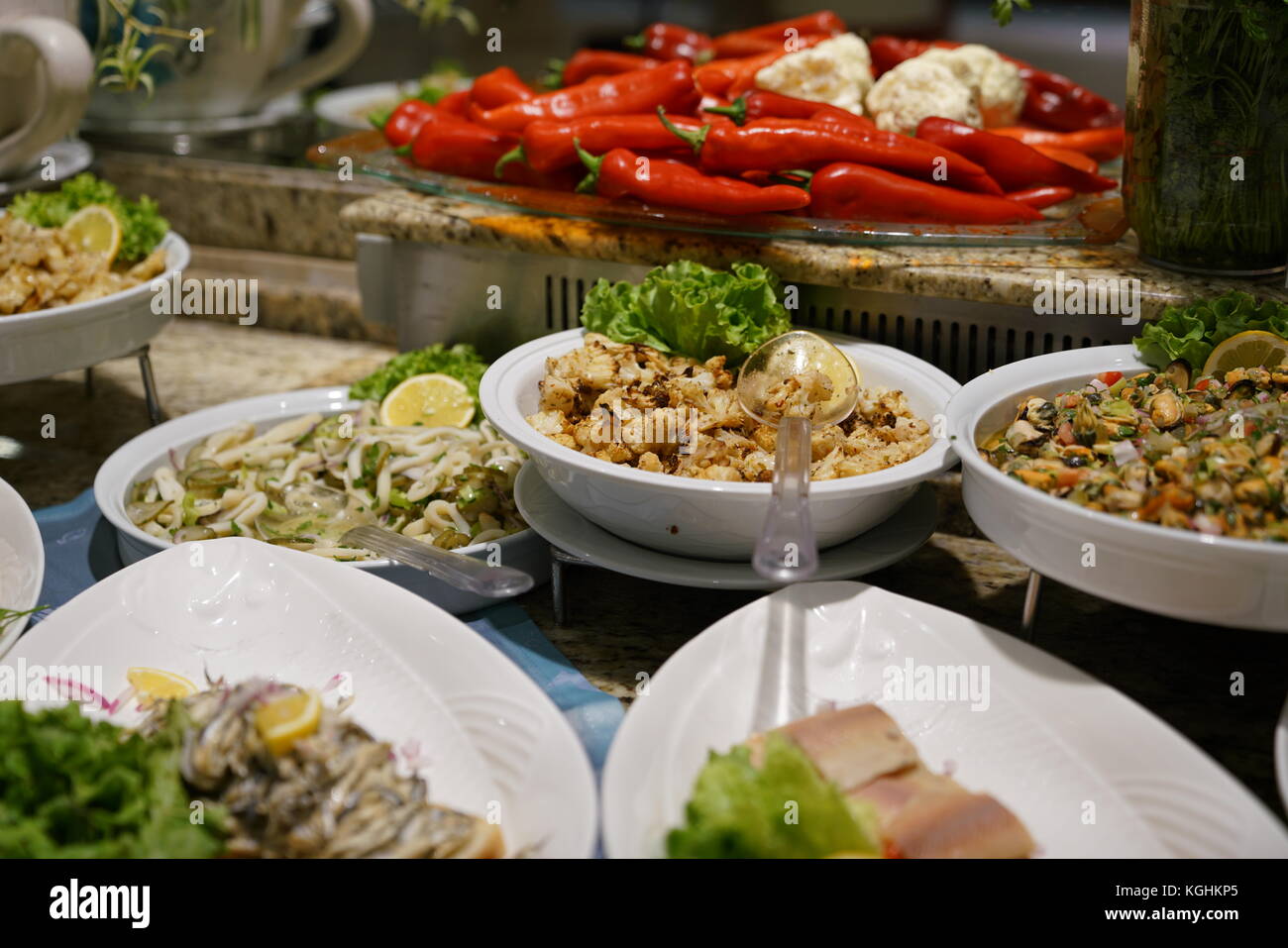 Dinner buffet with seafood, salmon, fish, pepper and other vegetables