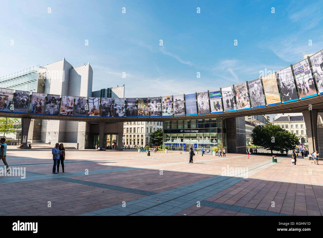 Brussels, Belgium - August 28, 2017: Facade of the modern office buildings of the European Parliament and station Europe with people around in Brussel Stock Photo