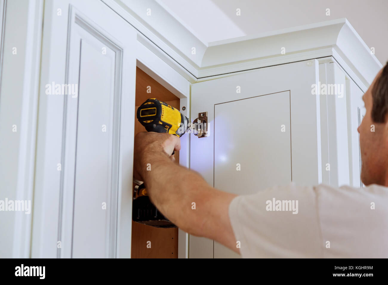 Adjusting Fixing Door Kitchen Cabinets Stock Photo 165119296 Alamy