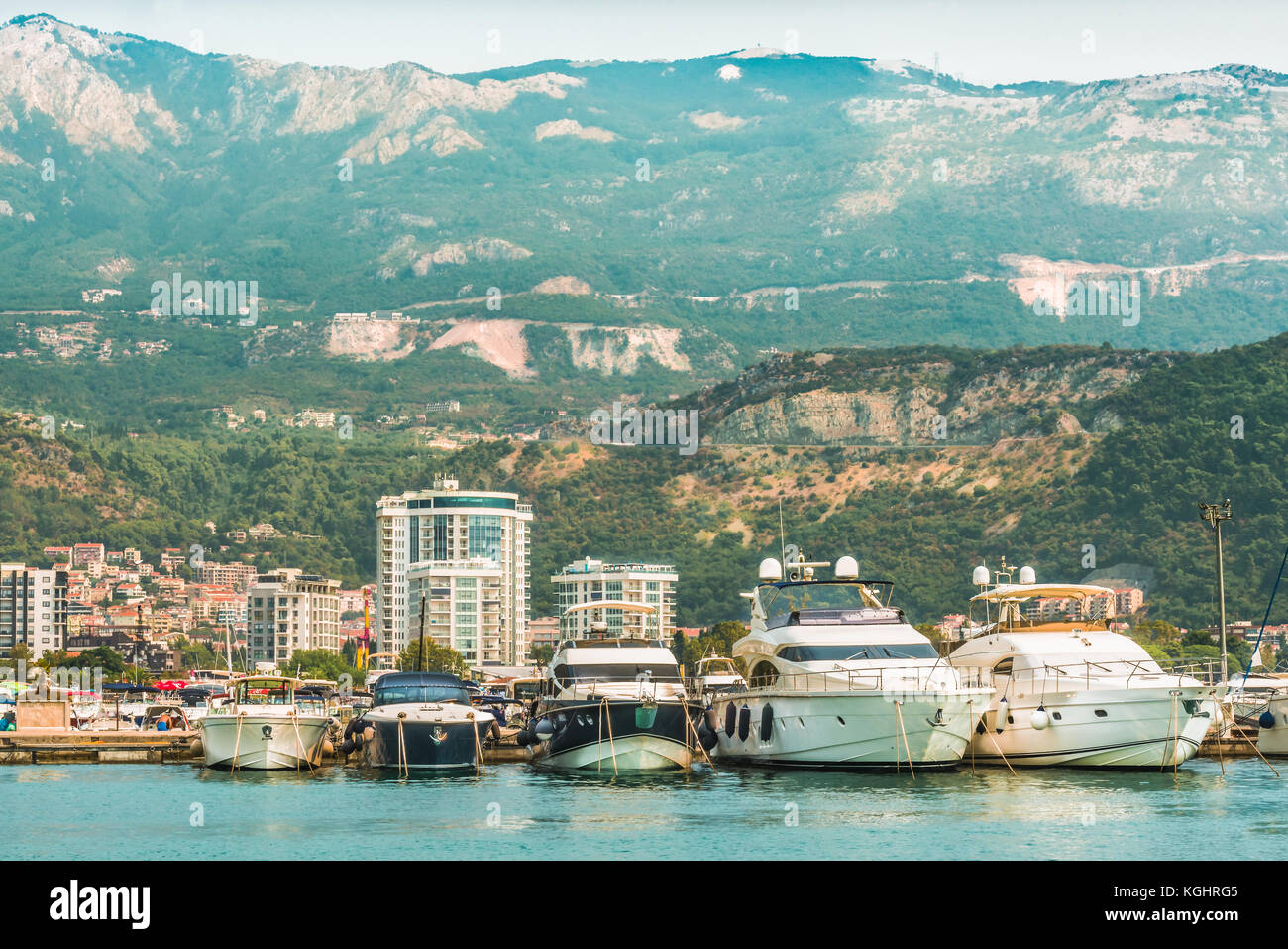 Marina for sailing yachts and boats with a view of the city of Budva and the Balkan Mountains, Budva Riviera, Montenegro. Stock Photo