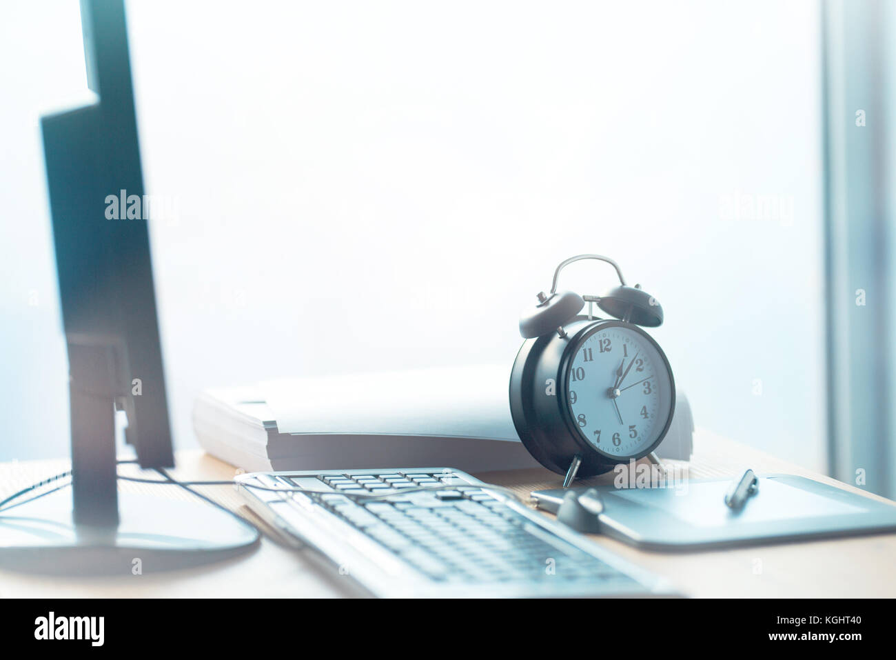 Business project deadline, vintage clock on office desk, selective focus Stock Photo