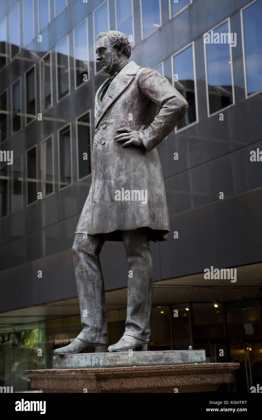 Statue of railway engineer , George Stephenson at Euston Station, London Stock Photo