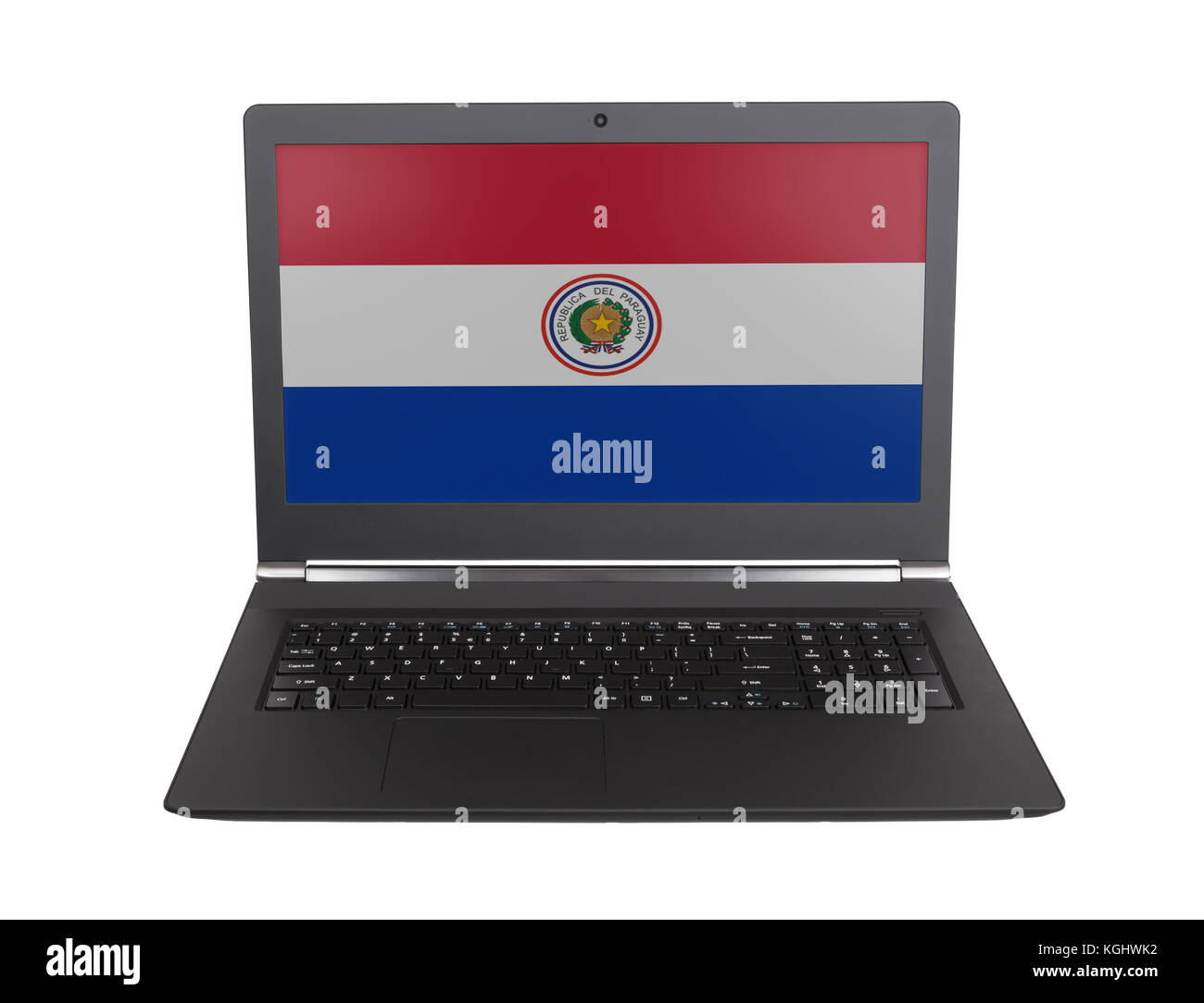 Hands working on laptop showing on the screen the flag of Paraguay Stock Photo