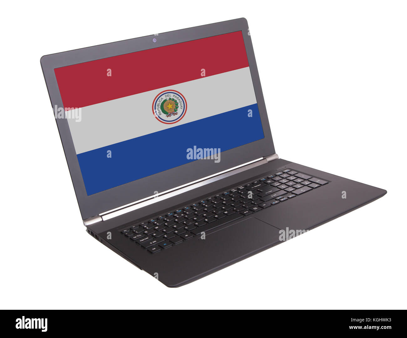 Hands working on laptop showing on the screen the flag of Paraguay Stock Photo