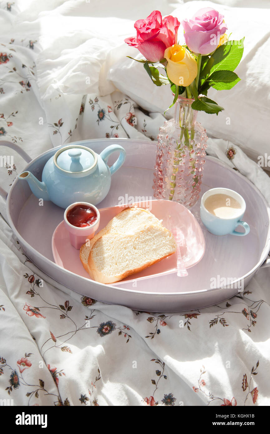 Breakfast tray with fresh coffee and brioche Stock Photo