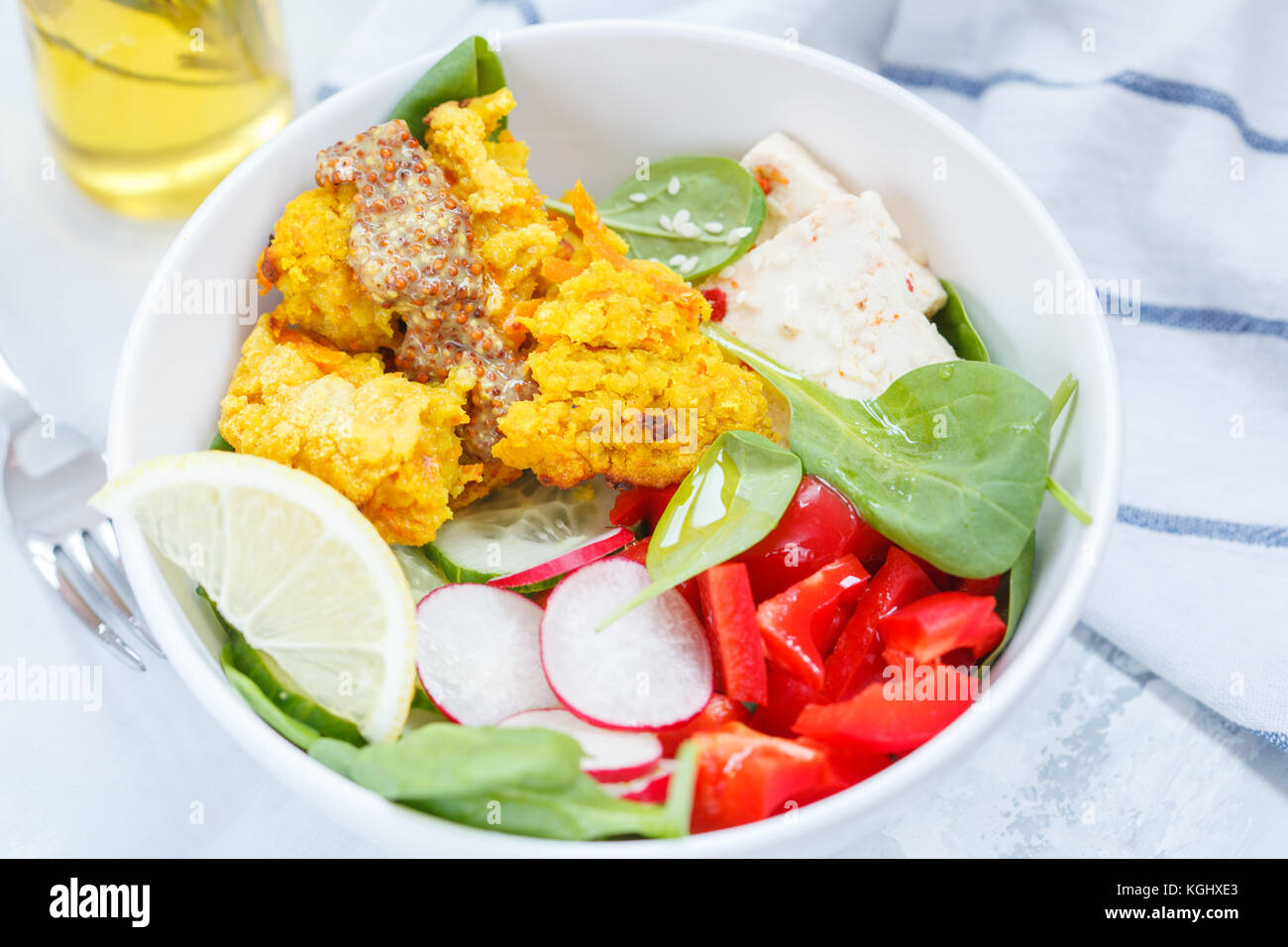 Vegan food an open lentil burger with tofu and vegetables. Healthy