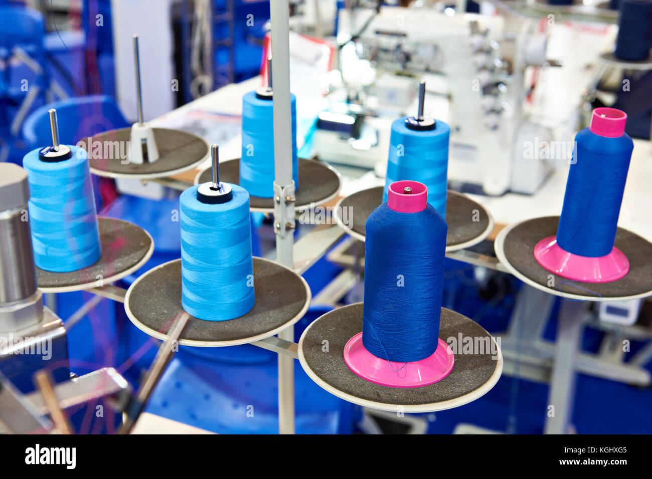 Sewing with threads and electric sewing machines Stock Photo