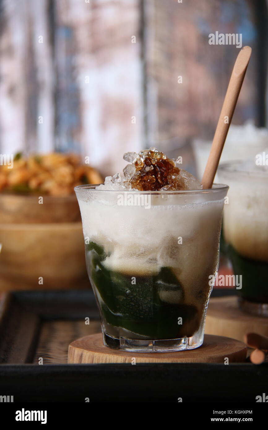 Es Daluman, Balinese Drink of Green Grass Jelly with Coconut Milk and Palm Sugar Stock Photo