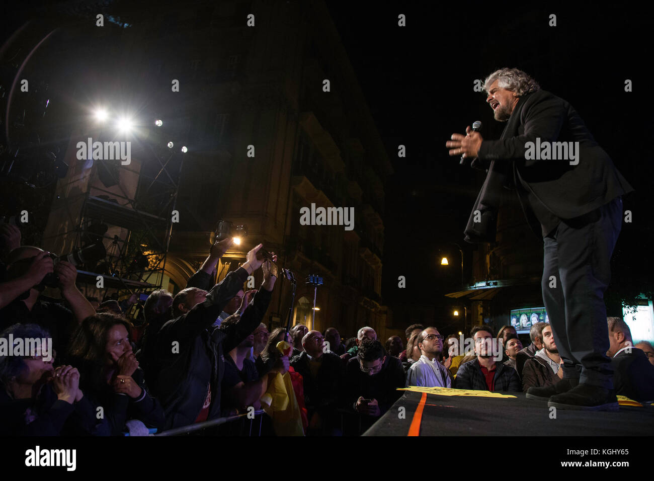 Beppe Grillo, political leader of the Five Stars Movement (M5S), speaks during a political rally before the Sicilian elections in Palermo (Italy). Stock Photo