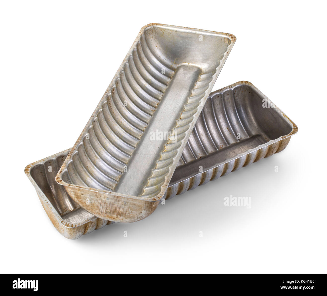 Old fluted tube baking pans isolated on white with clipping path Stock