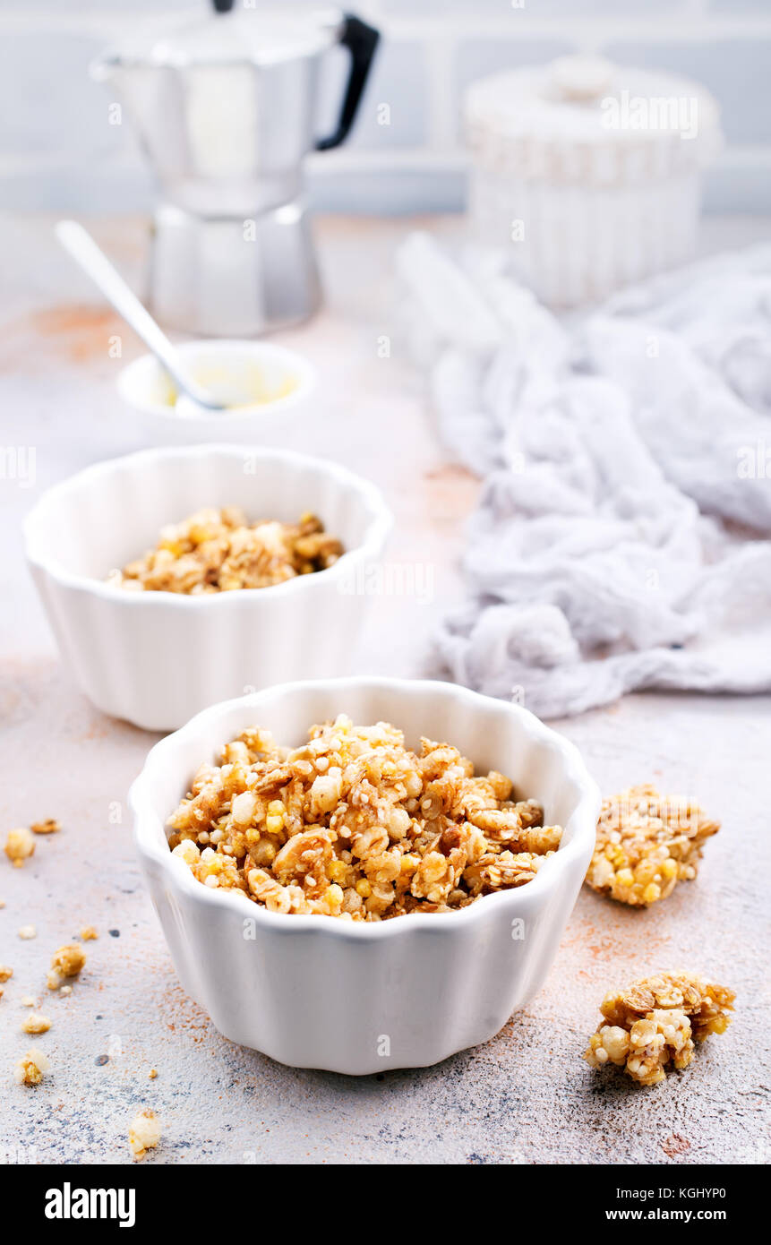 granola with honey in bowl and on a table Stock Photo Alamy