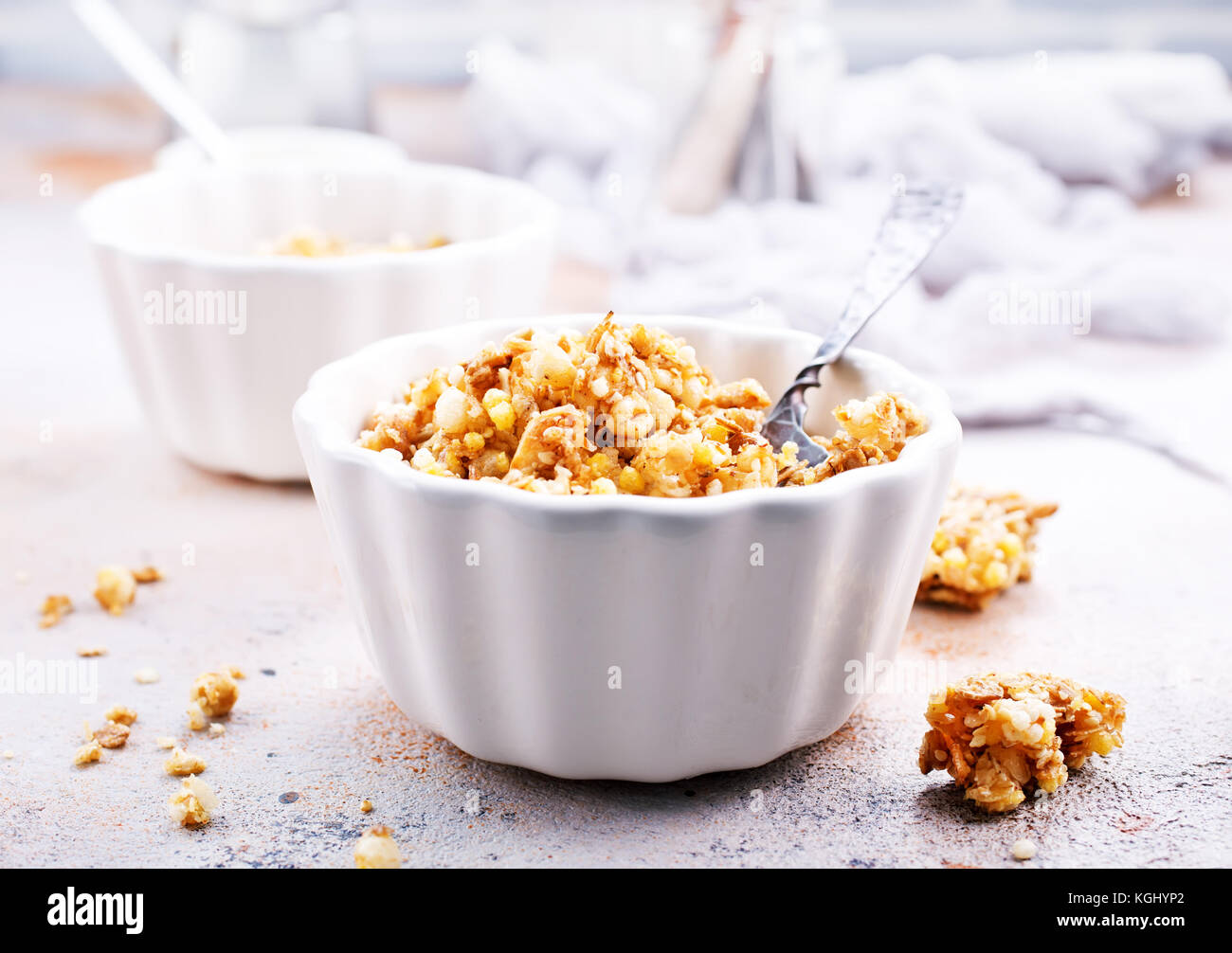 granola with honey in bowl and on a table Stock Photo Alamy