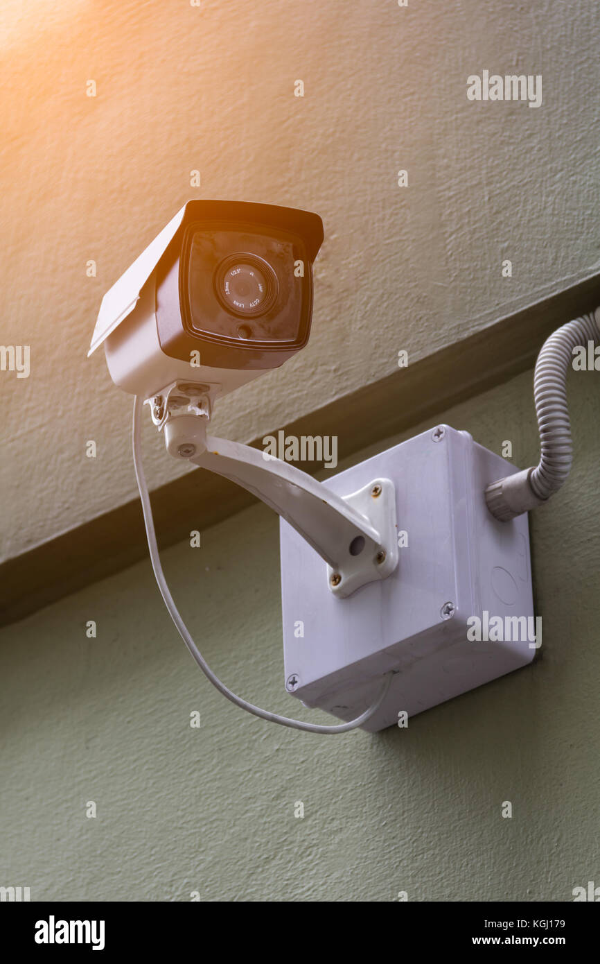 Security CCTV camera in office building, surveillance system Stock