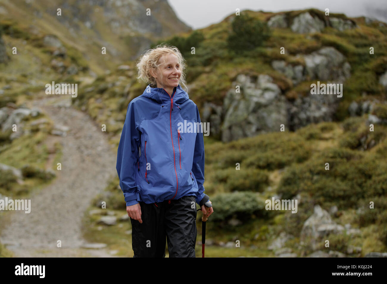 A woman hiking in the Austrian Mountains Stock Photo