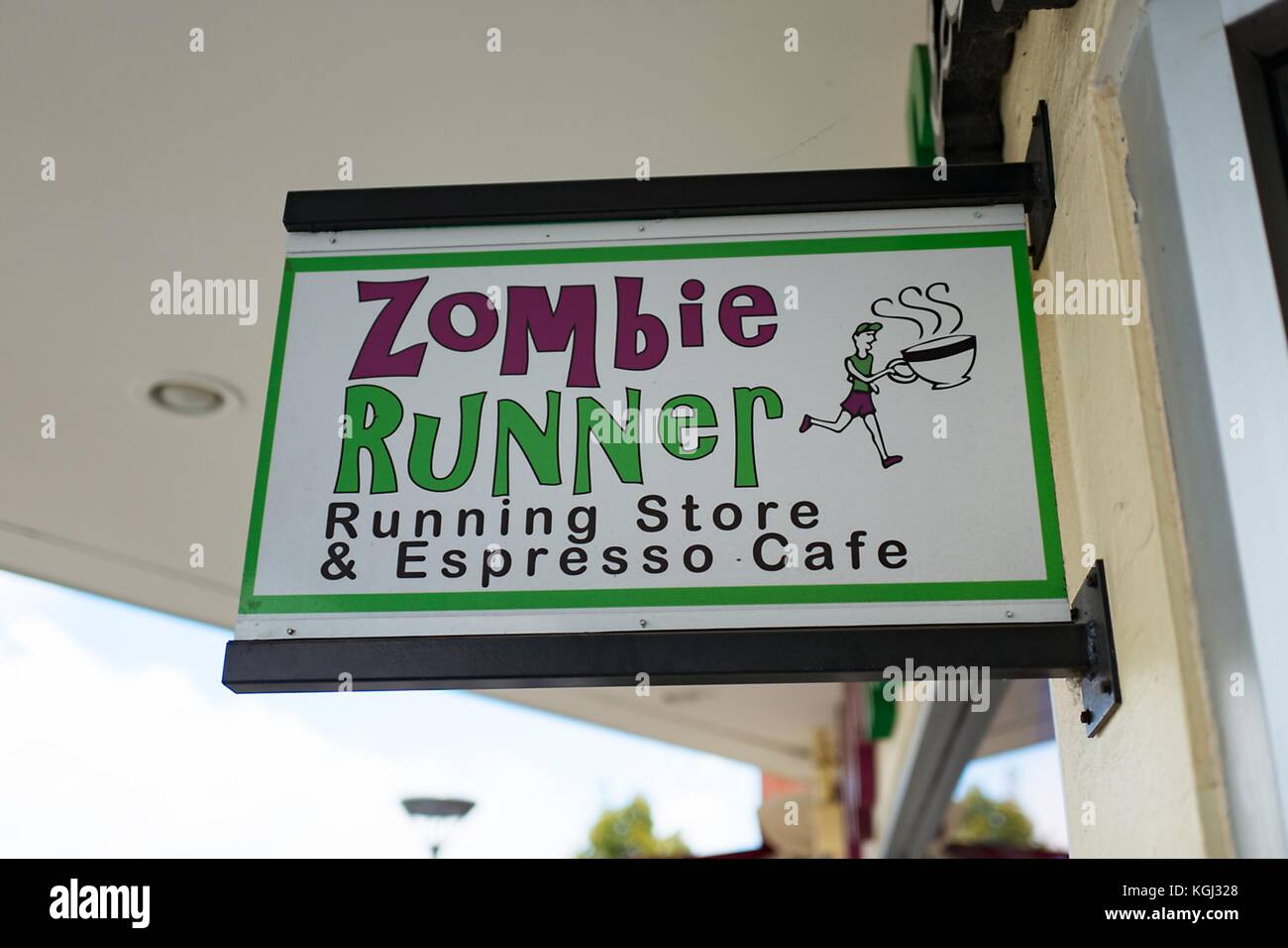 Sign on the facade of the humorously-named running store Zombie Runner, which incorporates a 'zombie apocalypse' theme, in Silicon Valley, Palo Alto, California, September 20, 2017. () Stock Photo