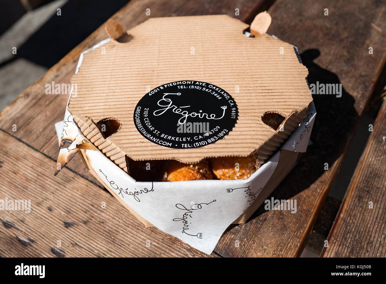 Close-up of iconic 'present' like takeout boxes from Gregoire, a trendy takeout restaurant in the Gourmet Ghetto (North Shattuck) neighborhood of Berkeley, California, October 6, 2017. () Stock Photo