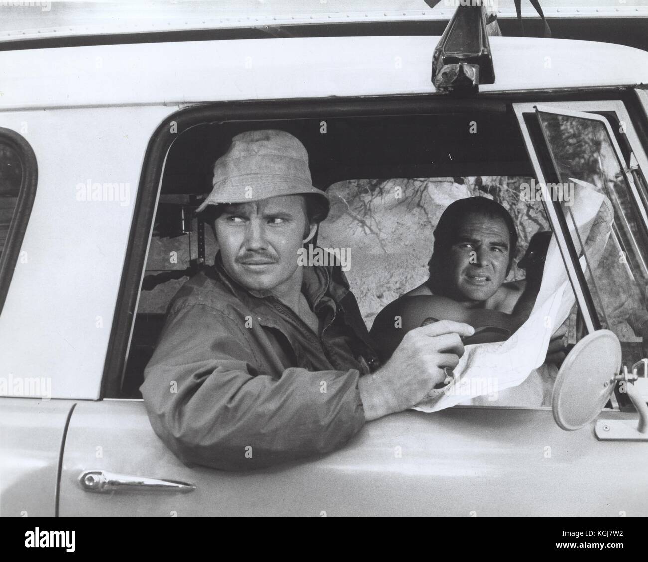 1972 JON VOIGHT with BURT REYNOLDS in Deliverance. Credit Warner