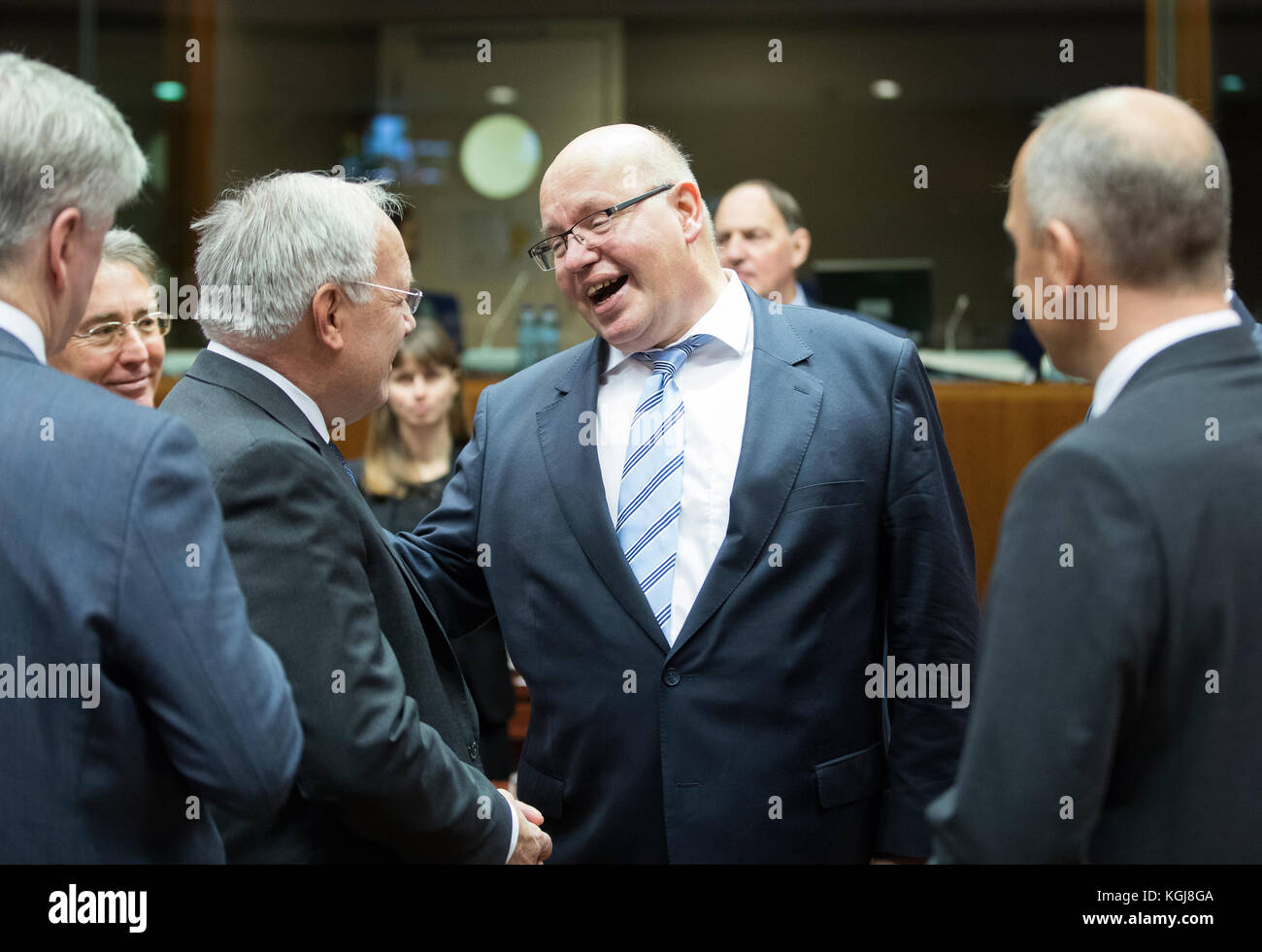 Brussels, Belgium, November 7, 2017: Swiss federal councillor Johann Schneider-Ammann (L) is talking with the German Chief of Staff and acting finance minister Peter Altmaier (R) during the European Finance Ministers meeting.- NO WIRE SERVICE - Photo: Thierry Monasse/dpa - NO WIRE SERVICE - Photo: Thierry Monasse/dpa Stock Photo