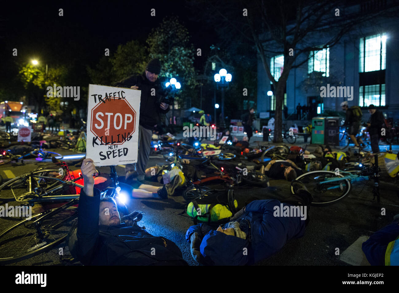 London, UK. 8th November, 2017. Campaigners from Stop Killing Cyclists stage a die-in during a vigil for Jerome Roussel outside Islington town hall. Jerome Roussel was  a 51-year-old cyclist who died in hospital on 25th June, seven weeks after a cycling accident on Pentonville Road. An inquest into his death was due to be held today. Credit: Mark Kerrison/Alamy Live News Stock Photo