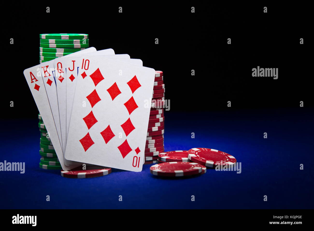 The best poker hand, royal flush with stuck of chips Stock Photo