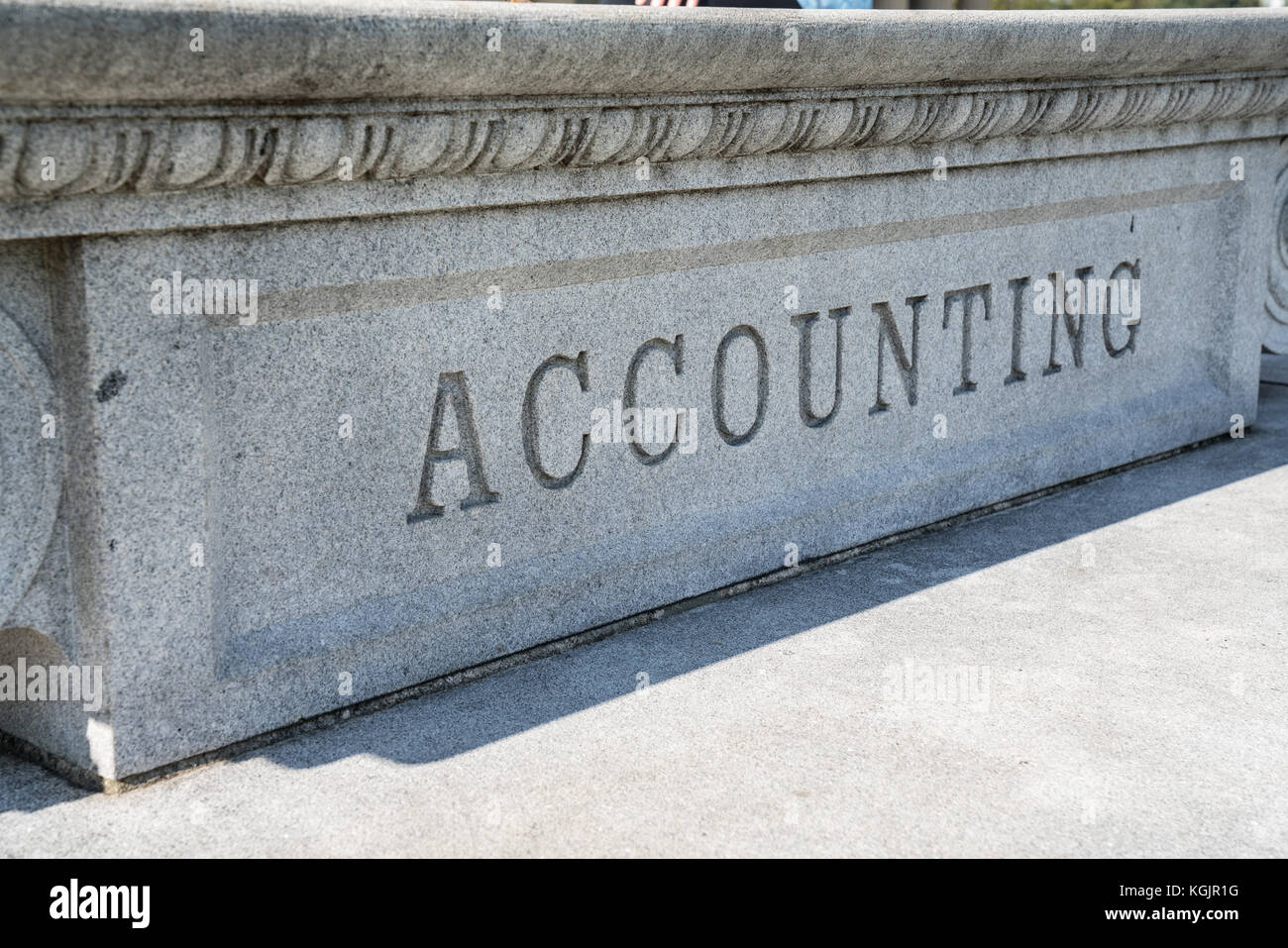 Accounting Sign engraved in Stone Stock Photo