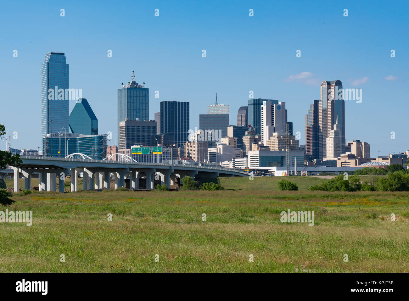 DALLAS, TX - MAY 13: Dallas city skyline from across the Trinity river ...