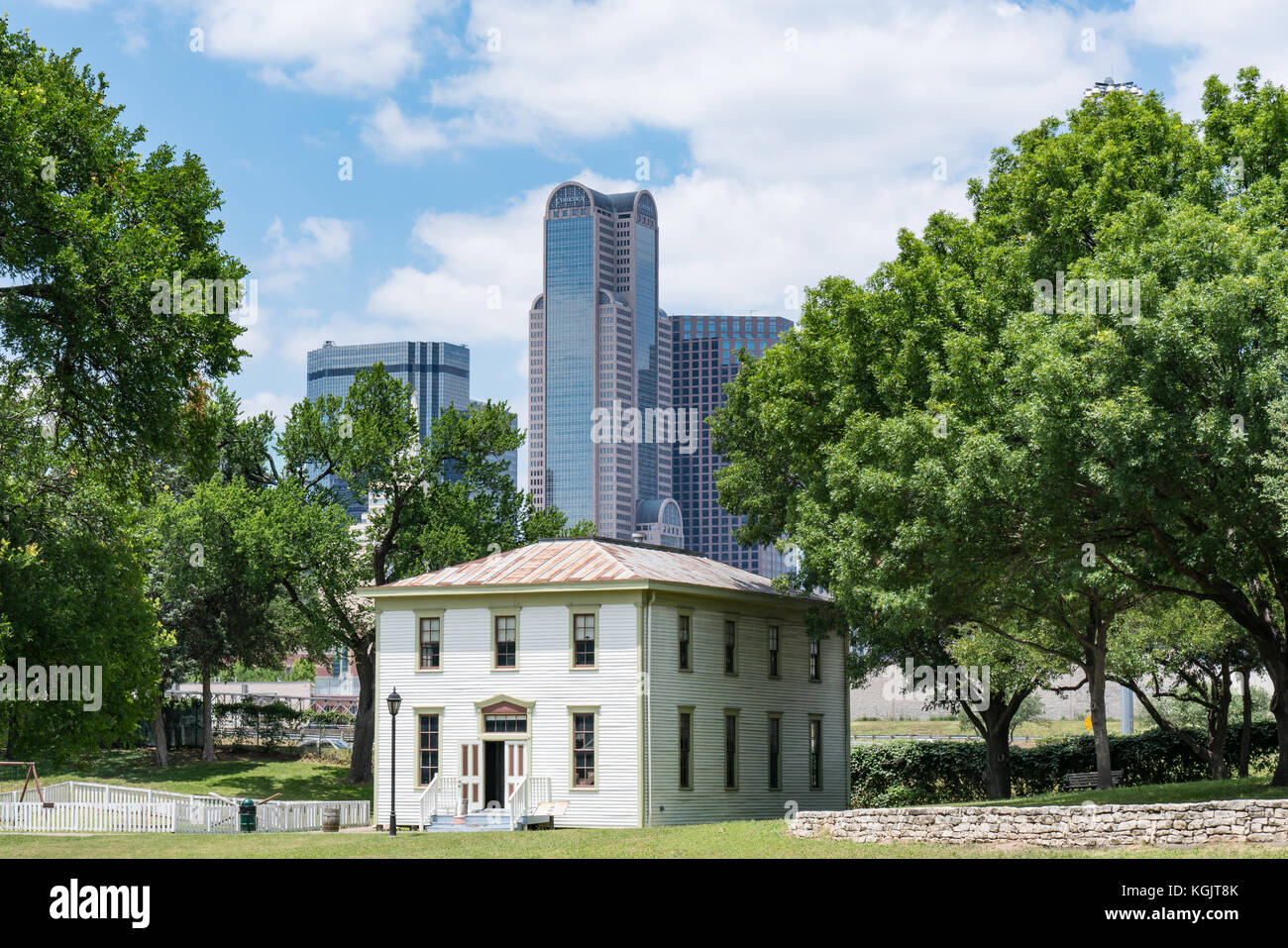 DALLAS, TX - MAY13, 2017: Historic Renner School building in the Dallas Heritage Village with the Dallas city skyline in background. Stock Photo