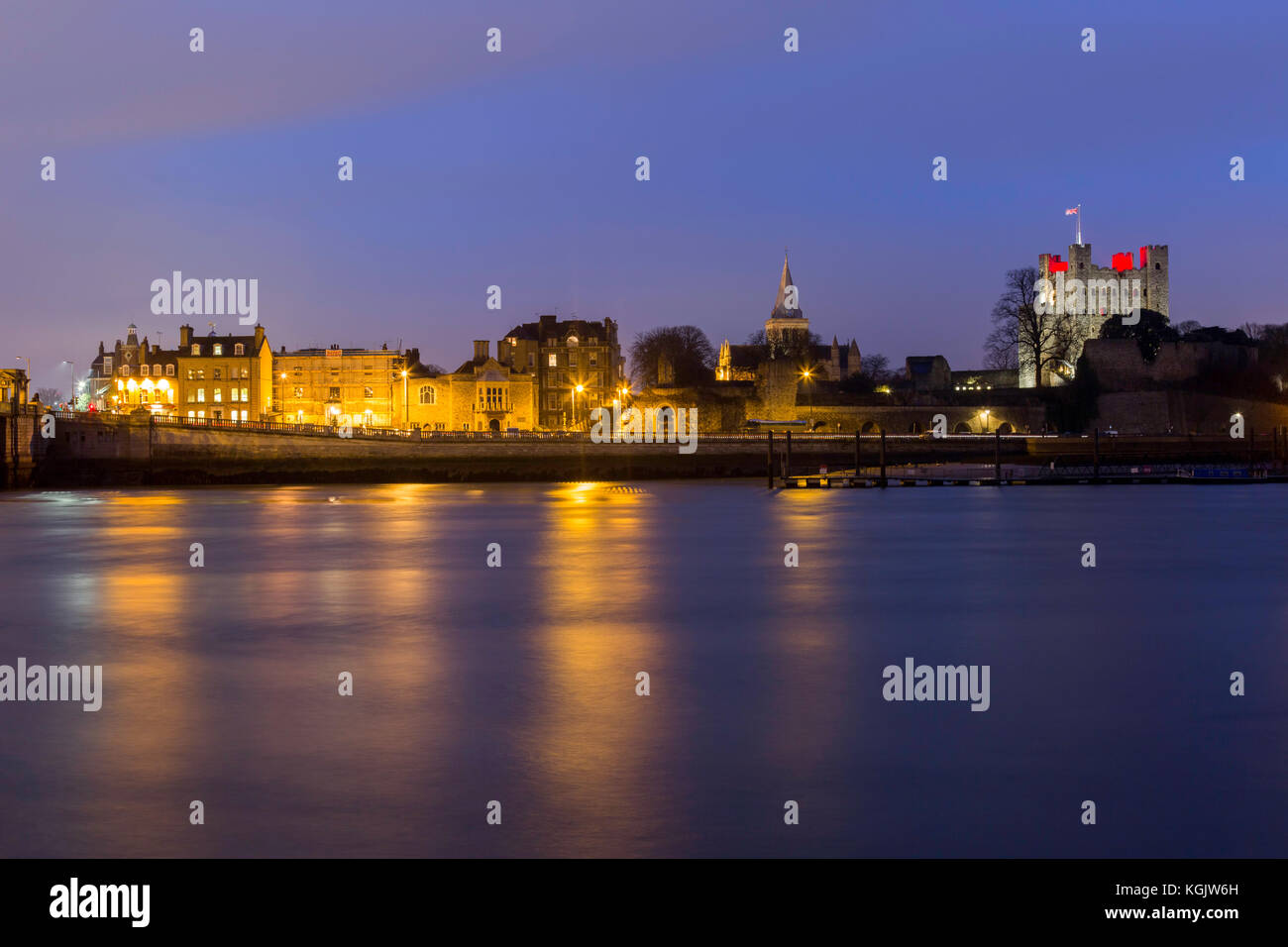 Rochester Castle, Cathedral and the buildings on Esplanade taken during the Blue Hour after sunset from across the River Medway at Strood, Kent, UK. Stock Photo