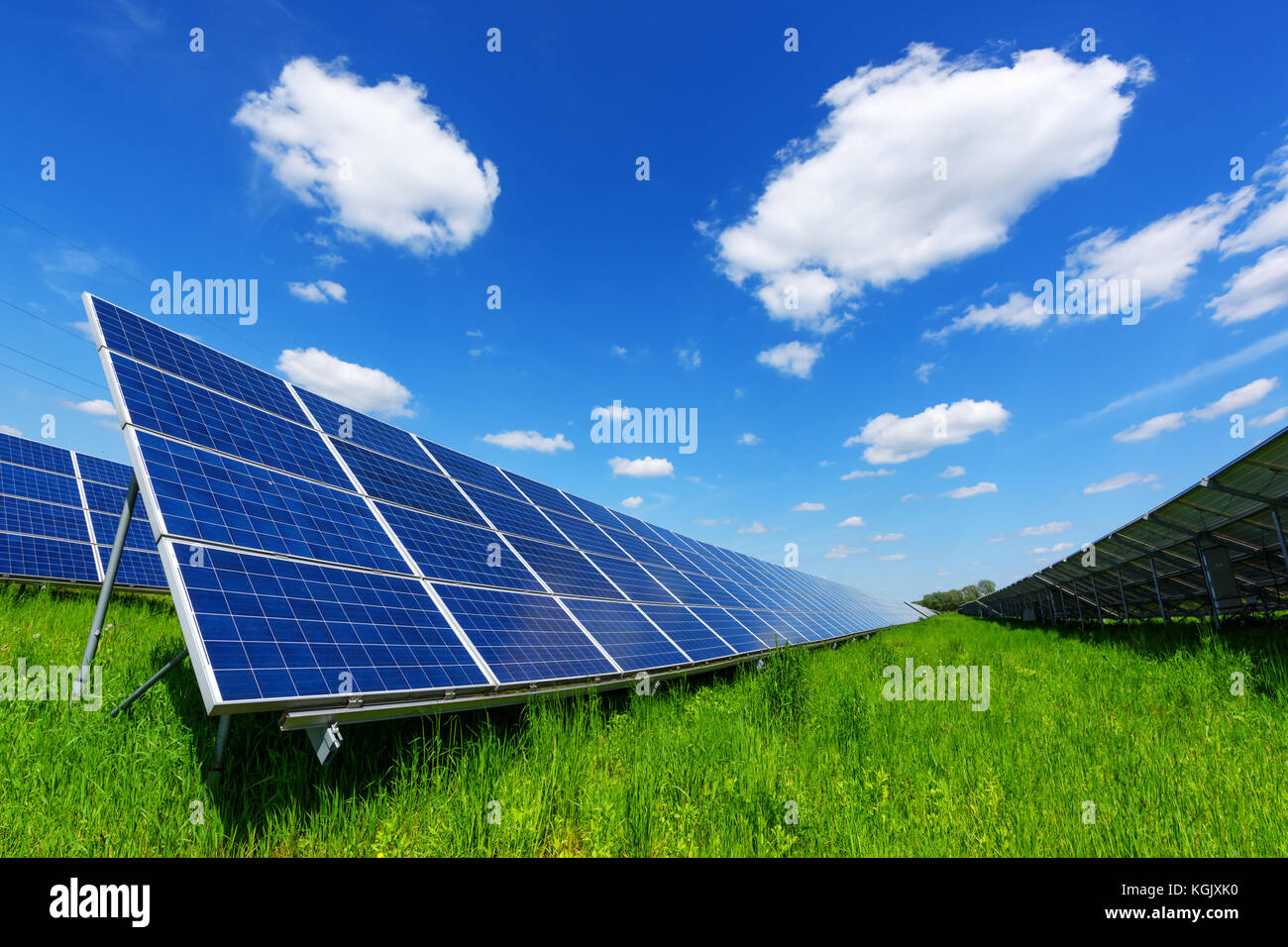Solar panel on blue sky background Stock Photo - Alamy