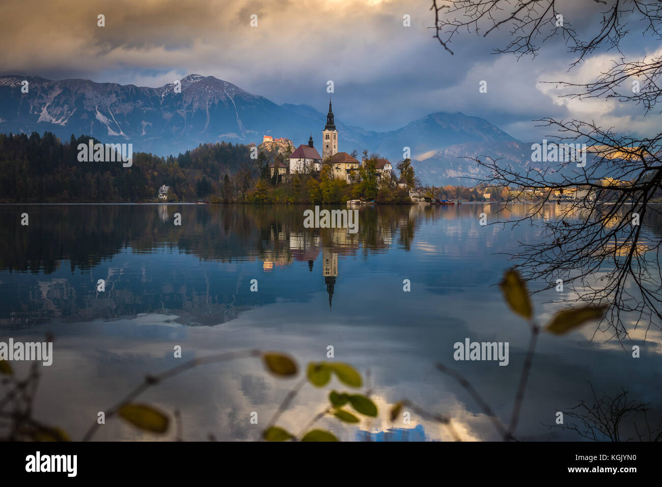 Bled, Slovenia - Beautiful autumn sunrise at Lake Bled with the famous Pilgrimage Church of the Assumption of Maria with Bled Castle and Julian Alps a Stock Photo