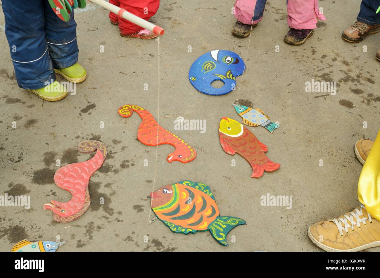 children's gamecatching fish.Baby tries a hook to catch the fish Stock