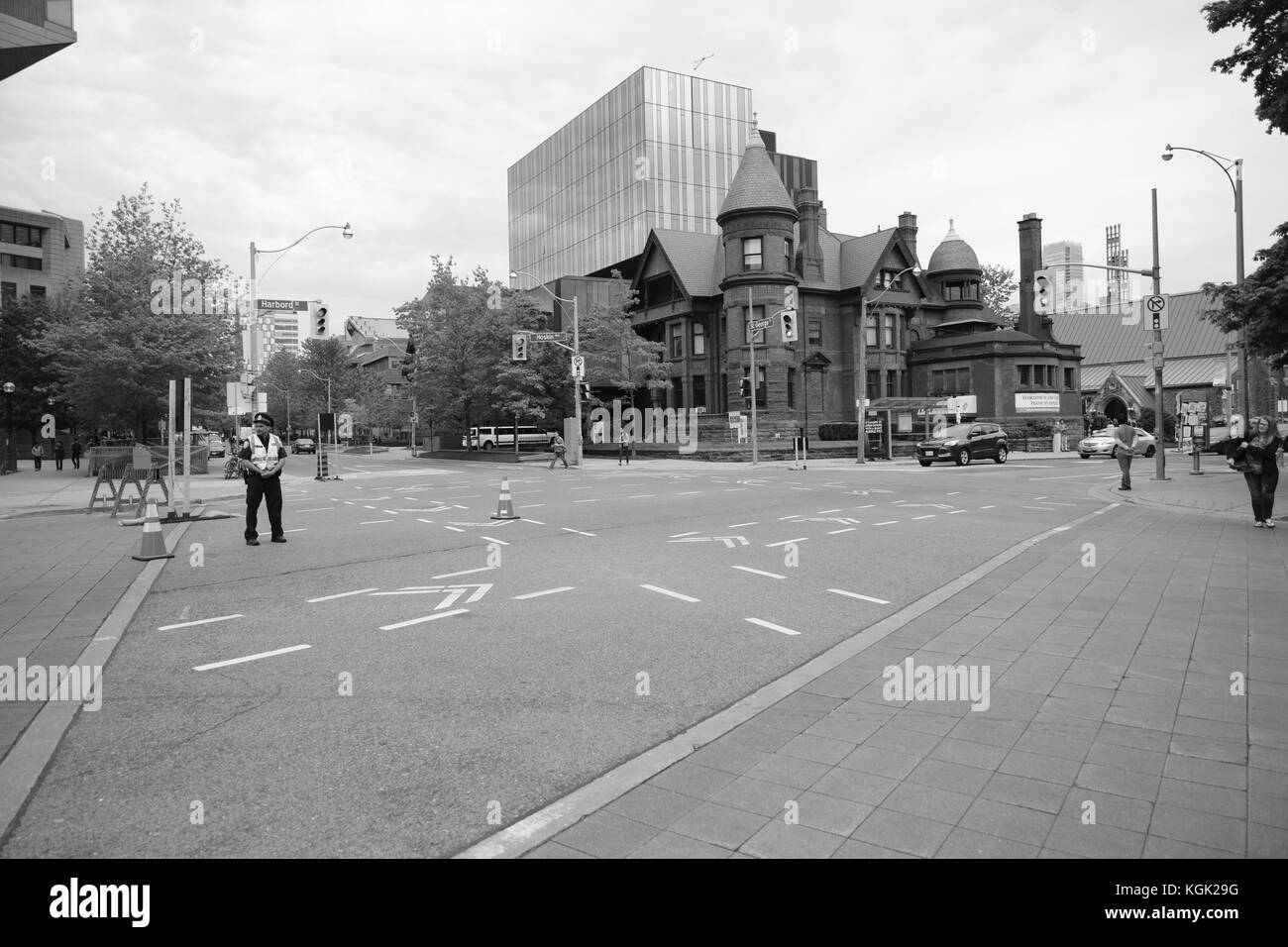 A sparsely-filled Toronto intersection. Just a simple attempt at capturing a pocket of quiet life in a city bustling with noise. Stock Photo
