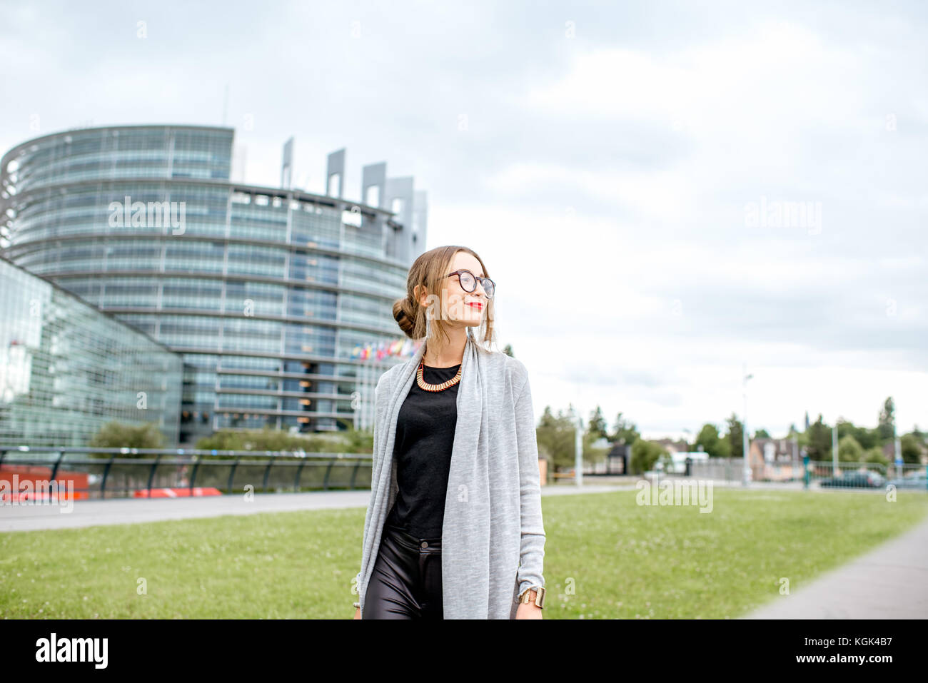 Woman near the European parliament building in Strasbourg Stock Photo