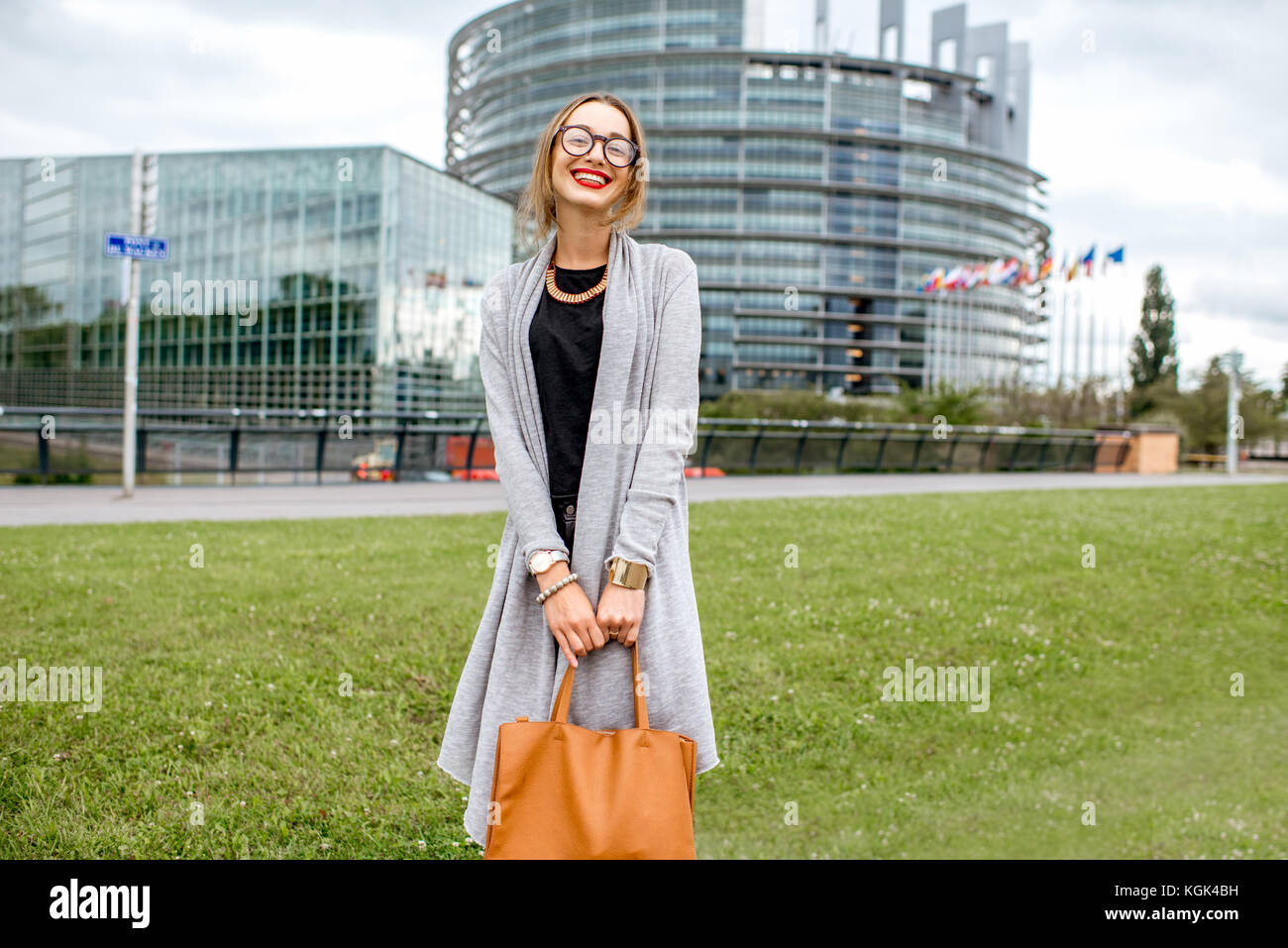 Woman near the European parliament building in Strasbourg Stock Photo