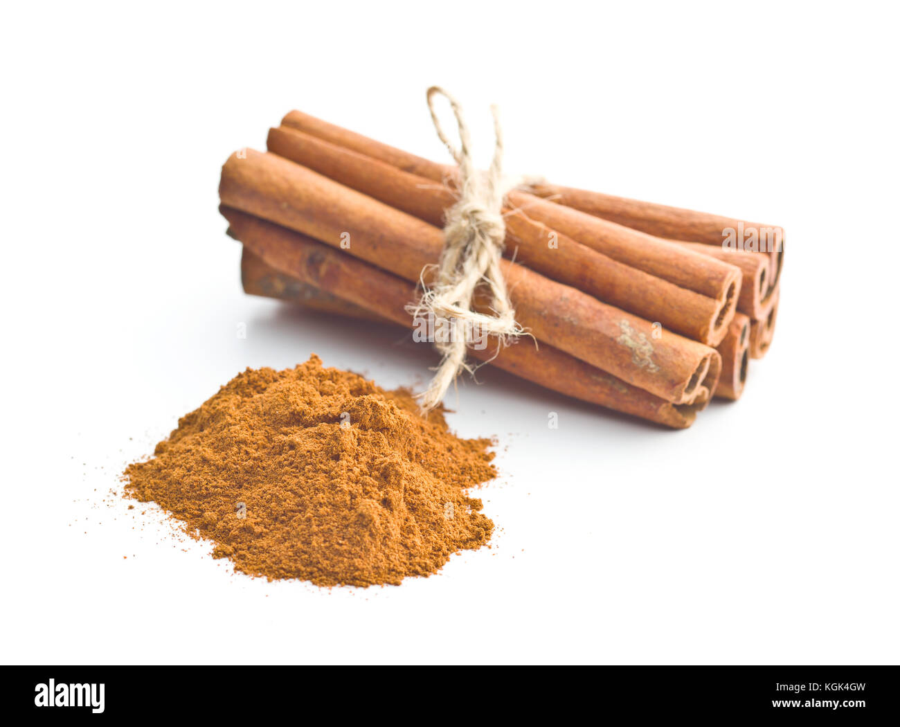 Cinnamon sticks and milled cinnamon isolated on white background. Stock Photo