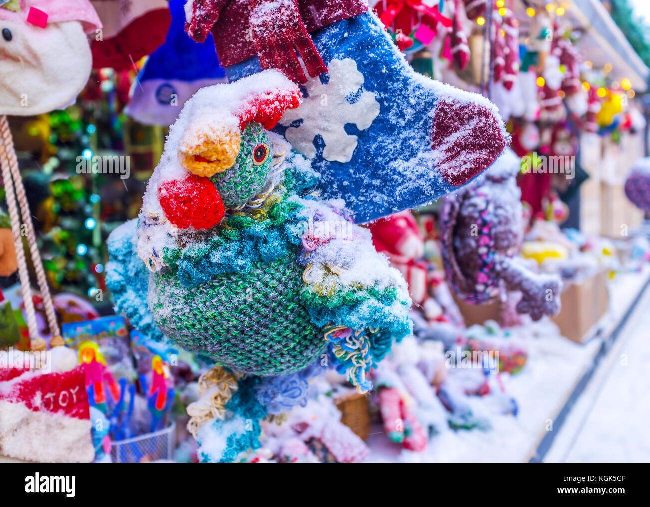 Handmade toys under the snow at the toy stall during Christmas Fair in Kiev, Ukraine Stock Photo