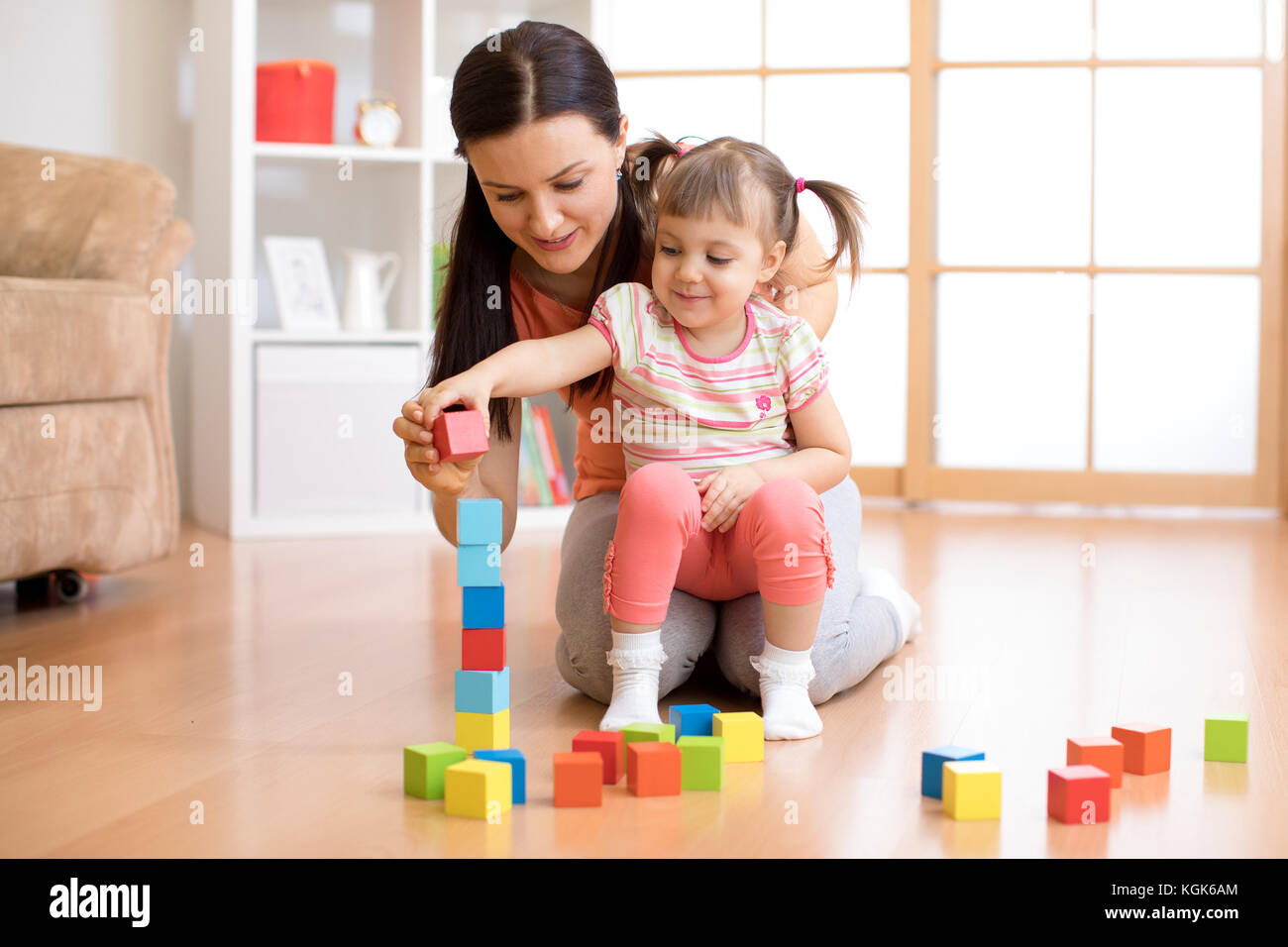 cute mother and child girl playing together Stock Photo