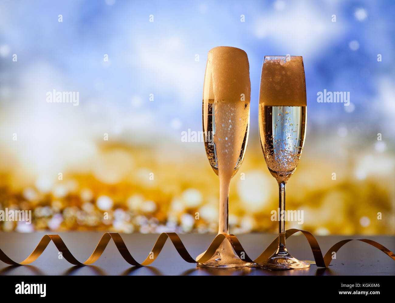two champagne glasses ready to bring in the New Year Stock Photo - Alamy
