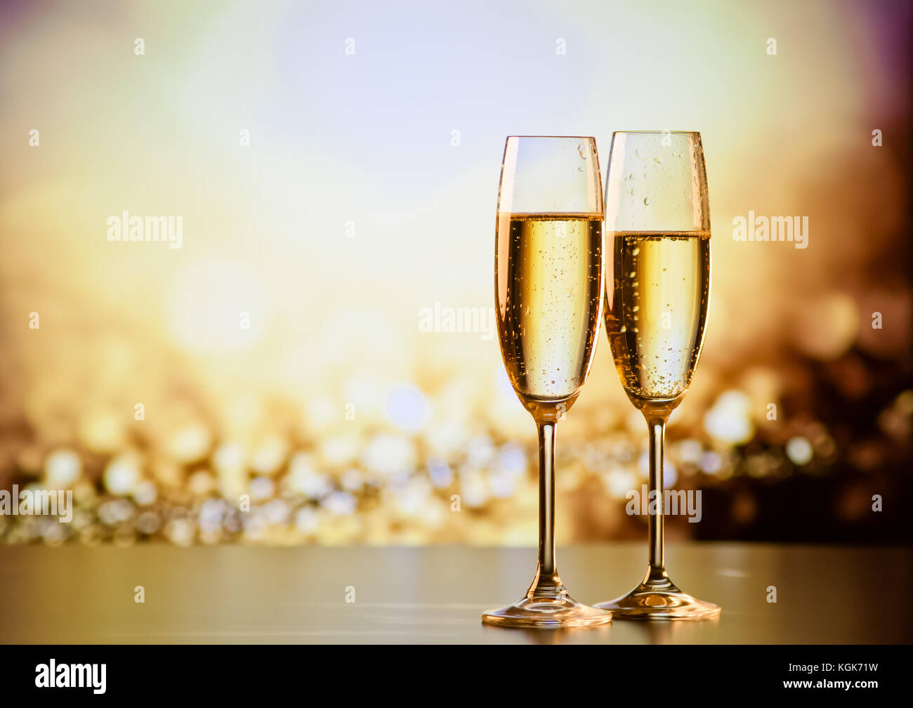 two champagne glasses ready to bring in the New Year Stock Photo - Alamy